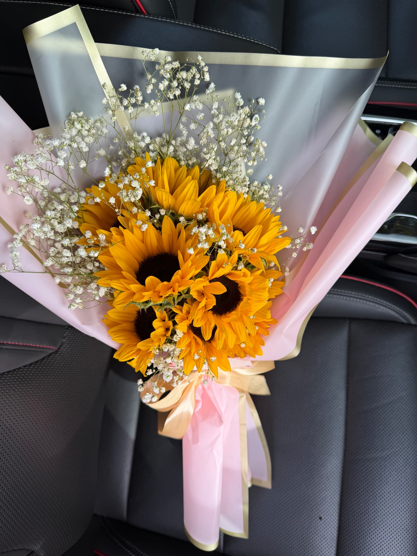 Sunflower bouquet in pink and gold wrap