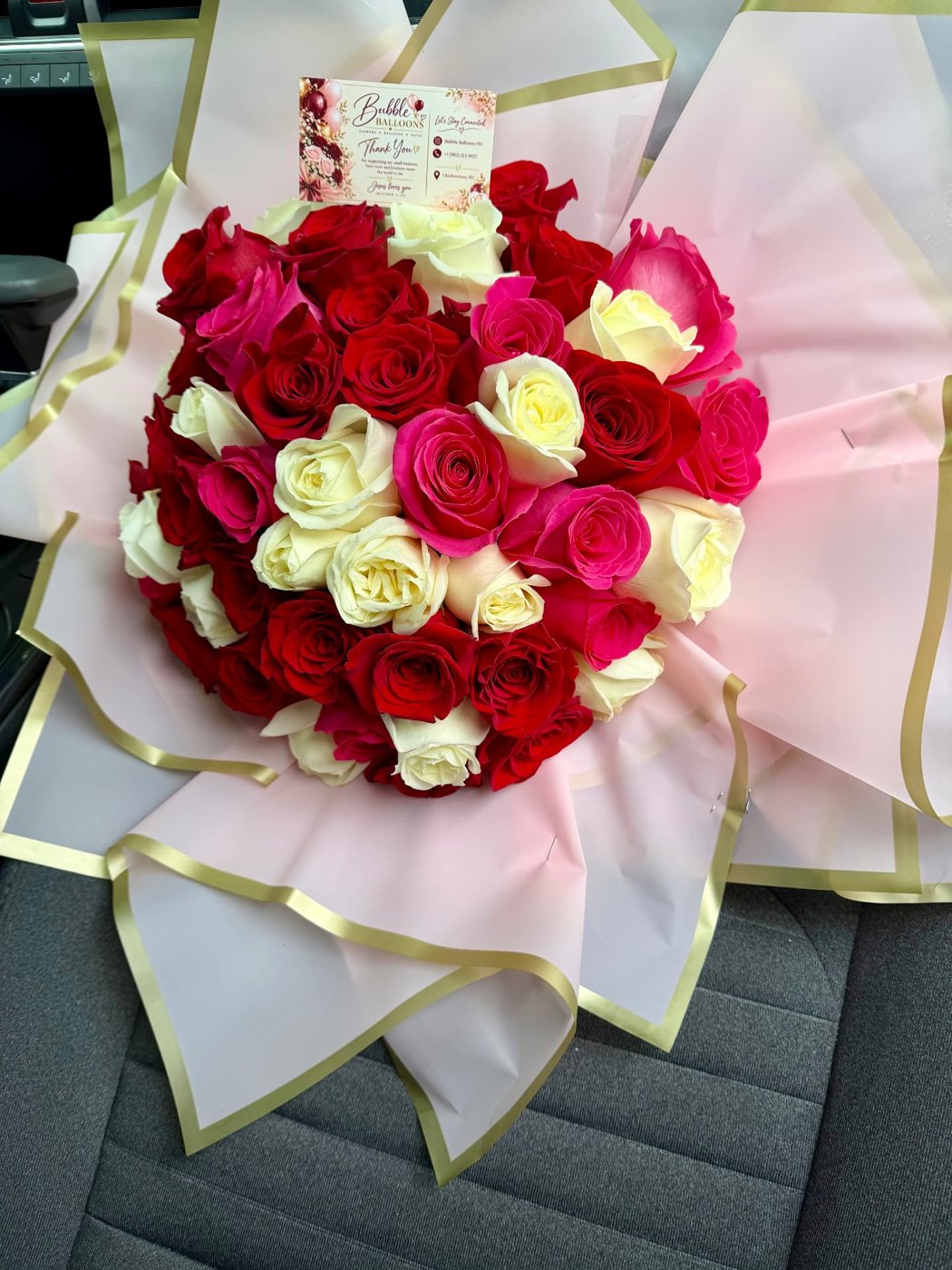 Red, pink and white rose bouquet