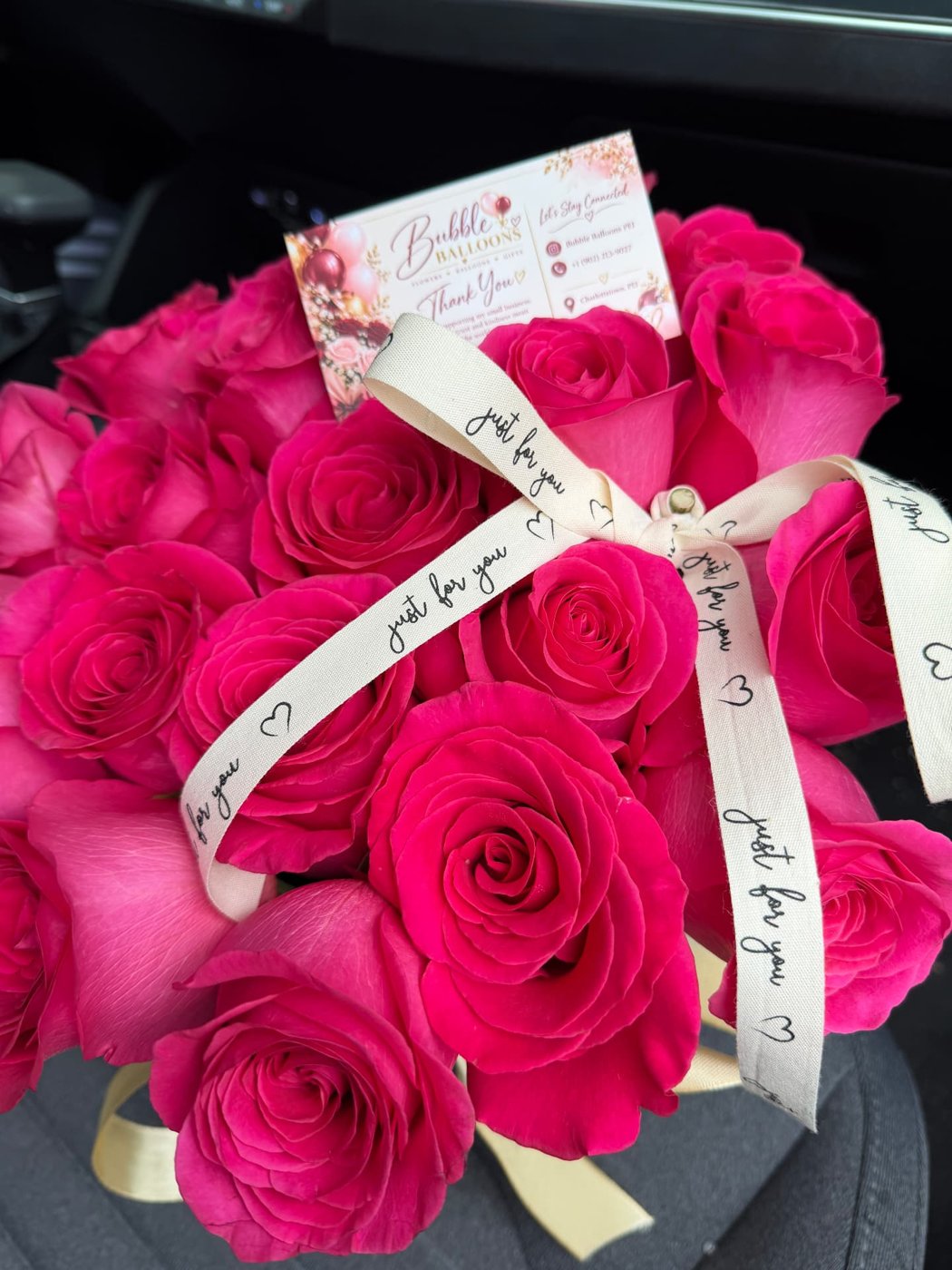 Hot pink roses with 'just for you' ribbon